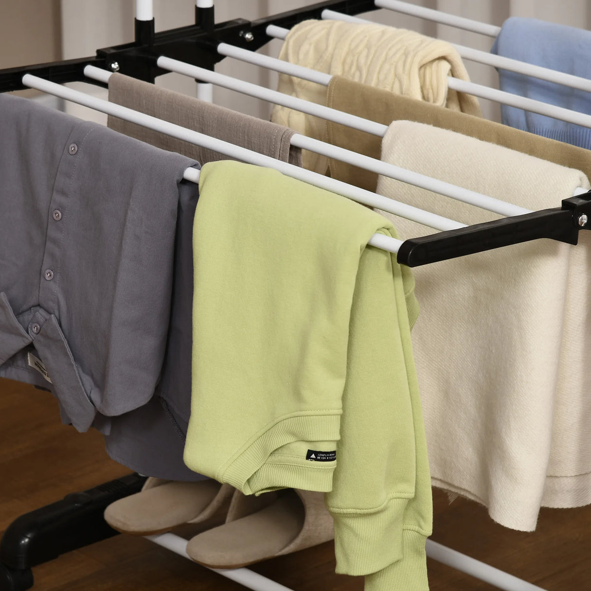 HOMCOM Foldable Clothes Drying Rack, 4-Tier Steel Garment Laundry Rack with Castors for Indoor and Outdoor Use, Black