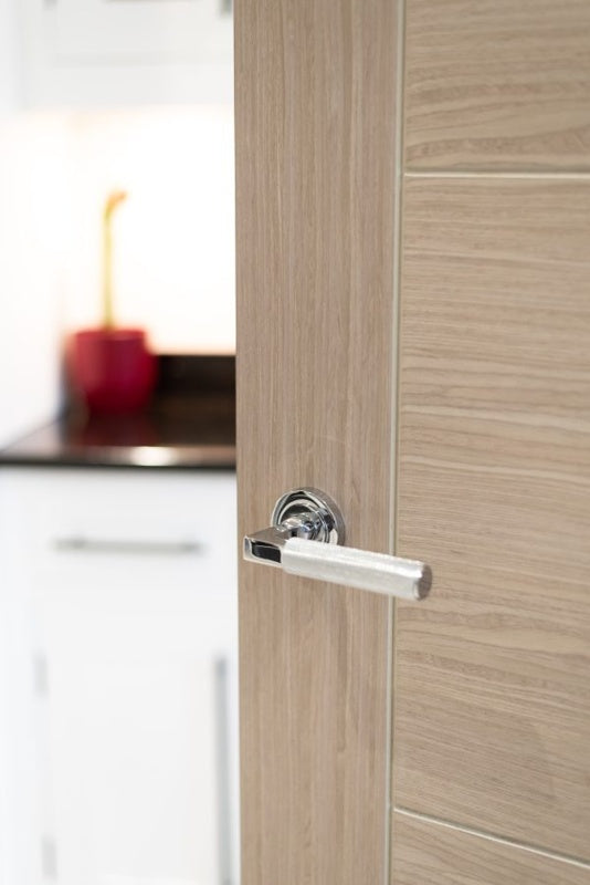 Millhouse Brass Cartwright Knurled Lever Door Handle on Round Rose - Polished Chrome - Set