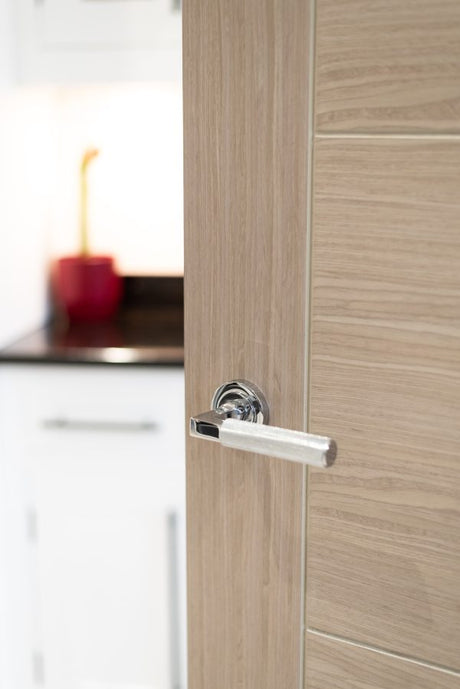 Millhouse Brass Cartwright Knurled Lever Door Handle on Round Rose - Polished Chrome - Set