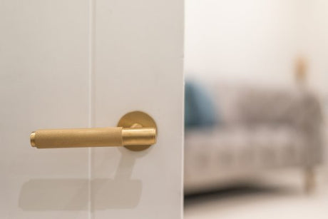 Millhouse Brass Crompton Knurled Lever Door Handle on 5mm Slimline Round Rose - Satin Brass - Set