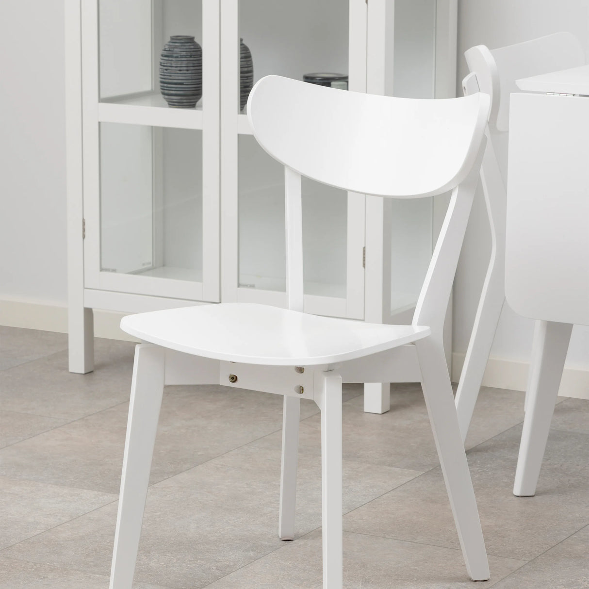 Roxby Square Dining Table in White includes 4 Roxby Dining Chair in White