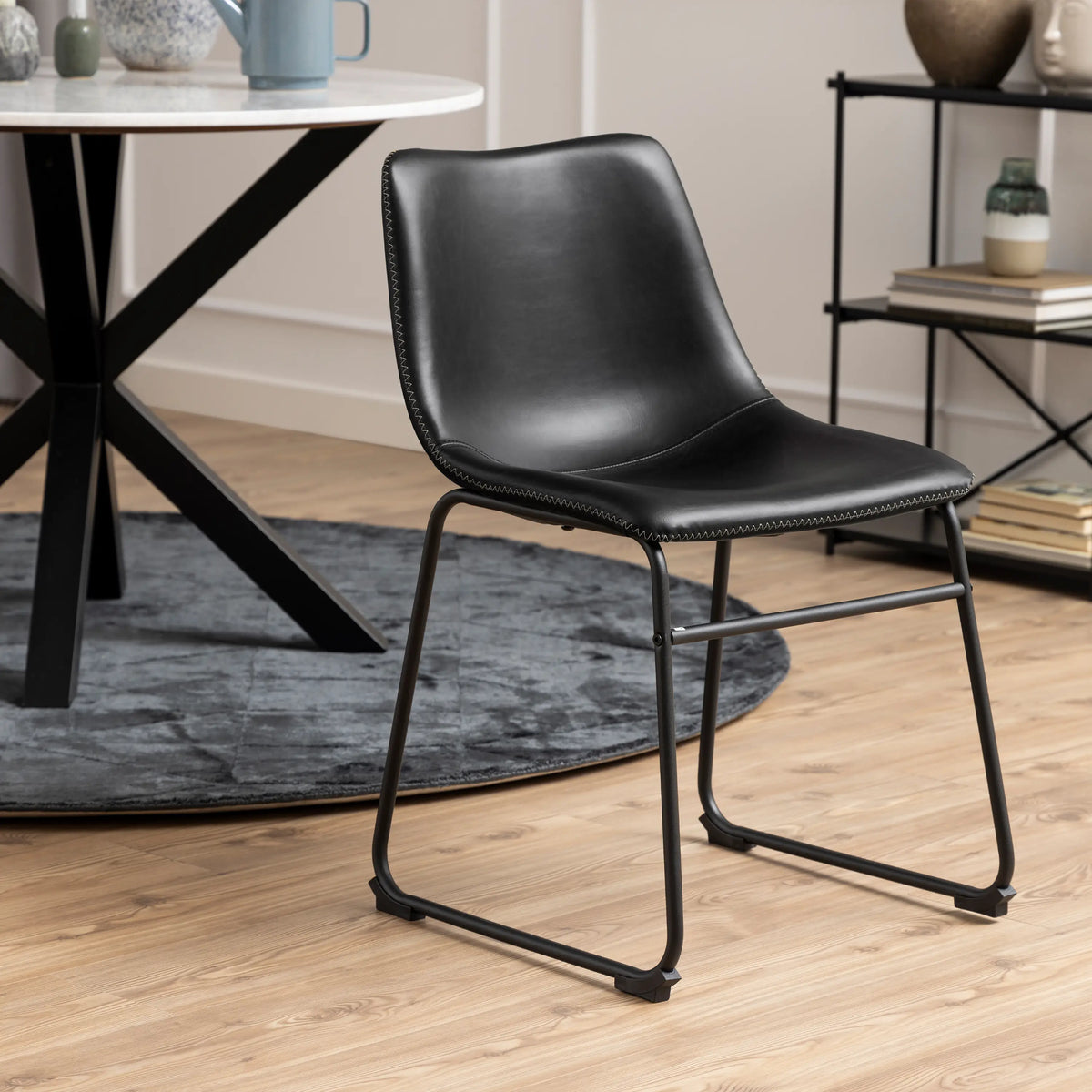Heaven Round White Polished Marble Dining Table includes 4 I_Oregon Dining Chairs In Black