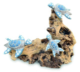 3 Swimming Turtles On Coral