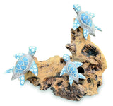 3 Swimming Turtles On Coral