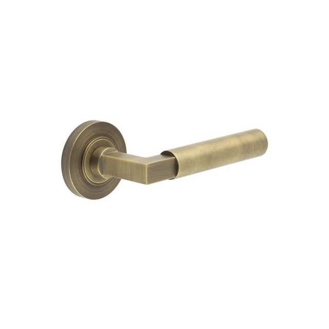 Westminster Door Handle on Plain Rose Antique Brass