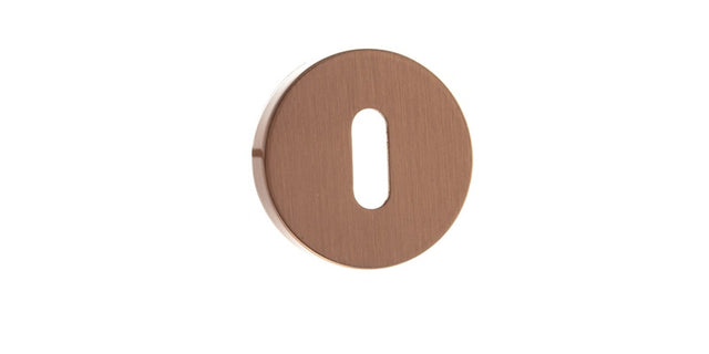 Forme Key Escutcheons on Minimal Round Rose - Urban Satin Copper - Pair