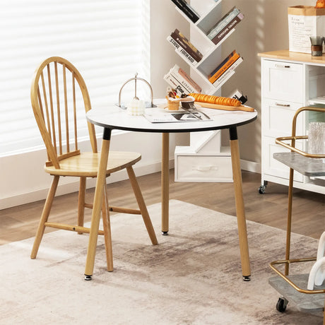 Modern round dining table in faux marble with white stainless steel legs