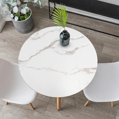 Modern round dining table in faux marble with white stainless steel legs