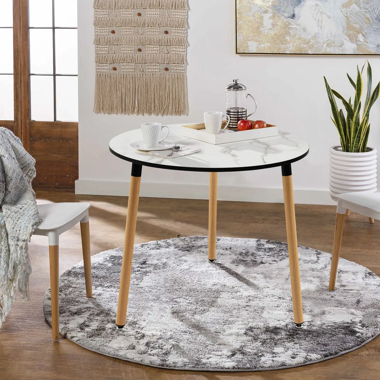Modern round dining table in faux marble with white stainless steel legs