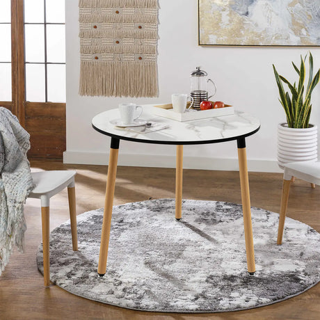 Modern round dining table in faux marble with white stainless steel legs