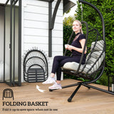 Outsunny Outdoor PE Rattan Swing Chair with Foldable Basket and Cushion, Garden Patio Hanging Egg Chair with Metal Stand, Headrest for Indoor and Outdoor, Black