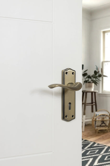 Old English Warwick Key Lever Door Handle on Backplate - Matt Antique Brass - Set
