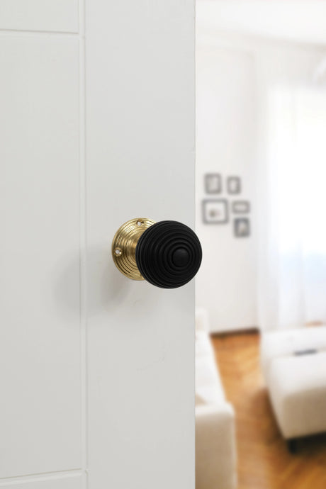 Old English Whitby Ebony Wood Reeded Beehive Mortice Knob on Face Fix Rose - Polished Brass - Set