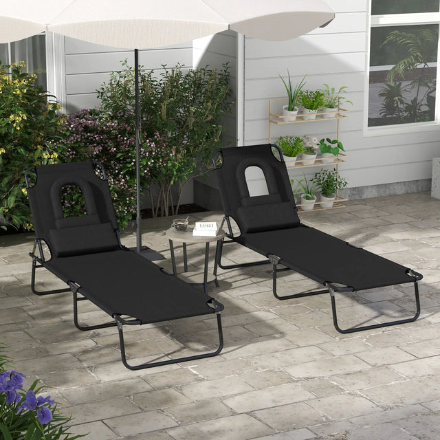 Outsunny Folding Sun Loungers Set of 2 with Face Hole, 4-Position Adjustable Backrest Garden Recliner Chairs Sunbeds, Outdoor Lounge Chairs with 600 D Oxford Cloth Seat, Pillow for Beach, Black