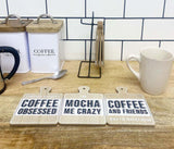 Set of Six Coffee Slogan Coasters On Metal Stand