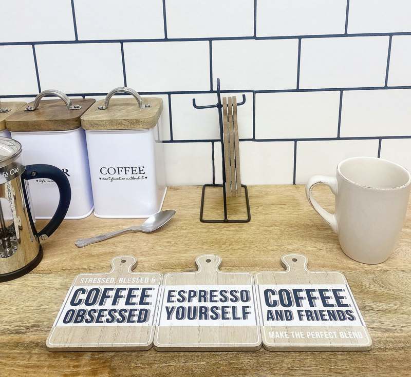 Set of Six Coffee Slogan Coasters On Metal Stand