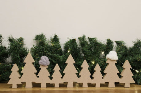 Row of Christmas Trees Decoration With Hats Green