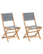 Set of 2 Garden Chairs Light Acacia Wood Grey PVC Fabric Folding Outdoor Patio Armless Classic Timeless Style Beliani