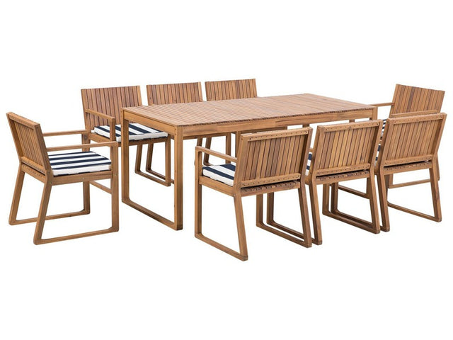 Garden Dining Set Light Acacia Wood Table 8 Chairs with Navy Blue and White Cushions Rustic Style Beliani