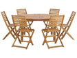 7 Piece Garden Dining Set Light Acacia Wood Round Table and 6 Folding Slatted Chairs  Beliani