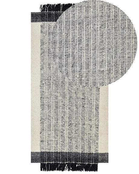 Rug White and Black Wool Cotton 80 x 150 cm Hand Woven Flat Weave with Tassels Beliani