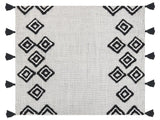 Throw Blanket White and Black Polyester PET 130 x 150 cm with Decorative Tassels Handmade Beliani