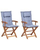 Set of 2 Garden Dining Chairs Light Wood with Blue Cushion Acacia Wood Frame Folding Rustic Design Beliani