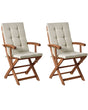 Set of 2 Garden Dining Chairs Light Wood with Taupe Cushions Acacia Wood Frame Folding Rustic Design Beliani