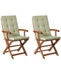 Set of 2 Garden Dining Chairs Light Wood with Light Green Cushions Acacia Wood Frame Folding Rustic Design Beliani