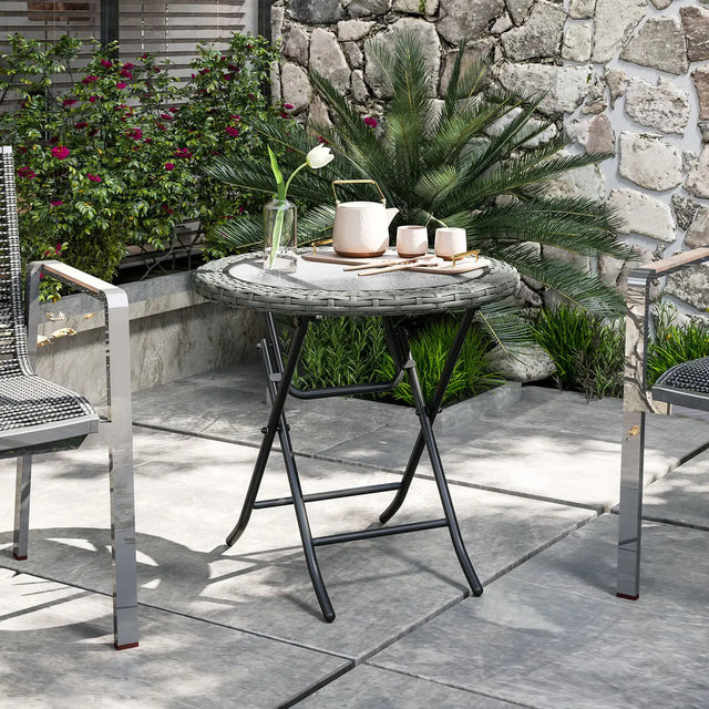 Outsunny Folding Rattan Garden Dining Table, 68 cm Round Rattan Garden Table with Water Ripple Tempered Glass Top, Wicker Edging  and Steel Frame for Outdoor, Patio, Grey